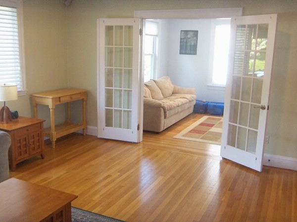 18 Jenness Street Quincy, MA 02169 - Photo 12 of 29 a living room with furniture and a window