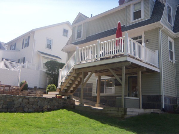 18 Jenness Street Quincy, MA 02169 - Photo 29 of 29 a front view of a house with a yard