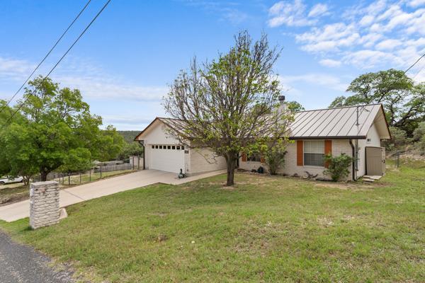 128 Ridge Grove Road Kerrville, TX 78028 - Photo 2 of 31 Front of Home