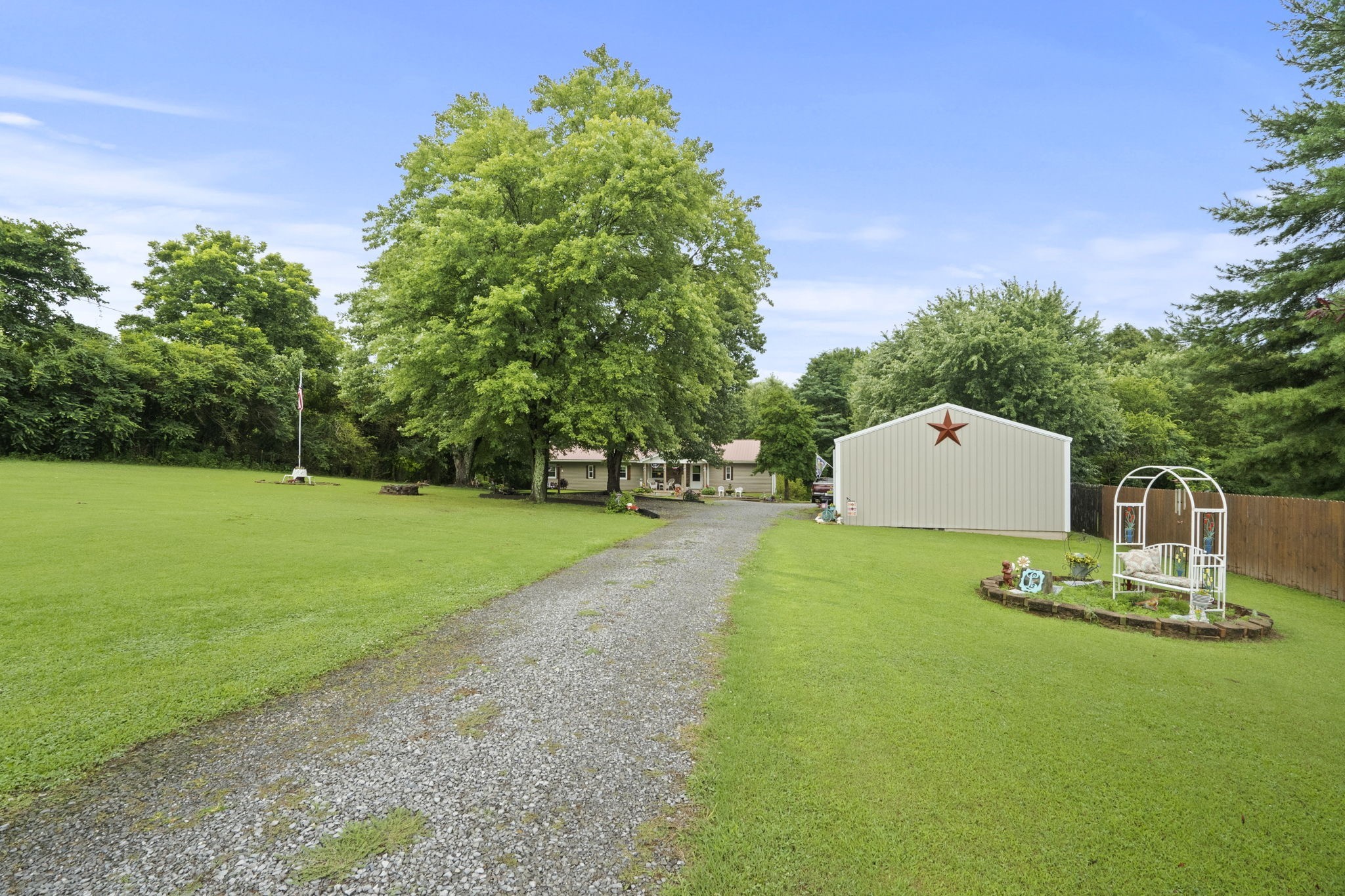 1680 New Deal Potts Road Portland, TN 37148 - Photo 7 of 37 a big yard with table and chairs