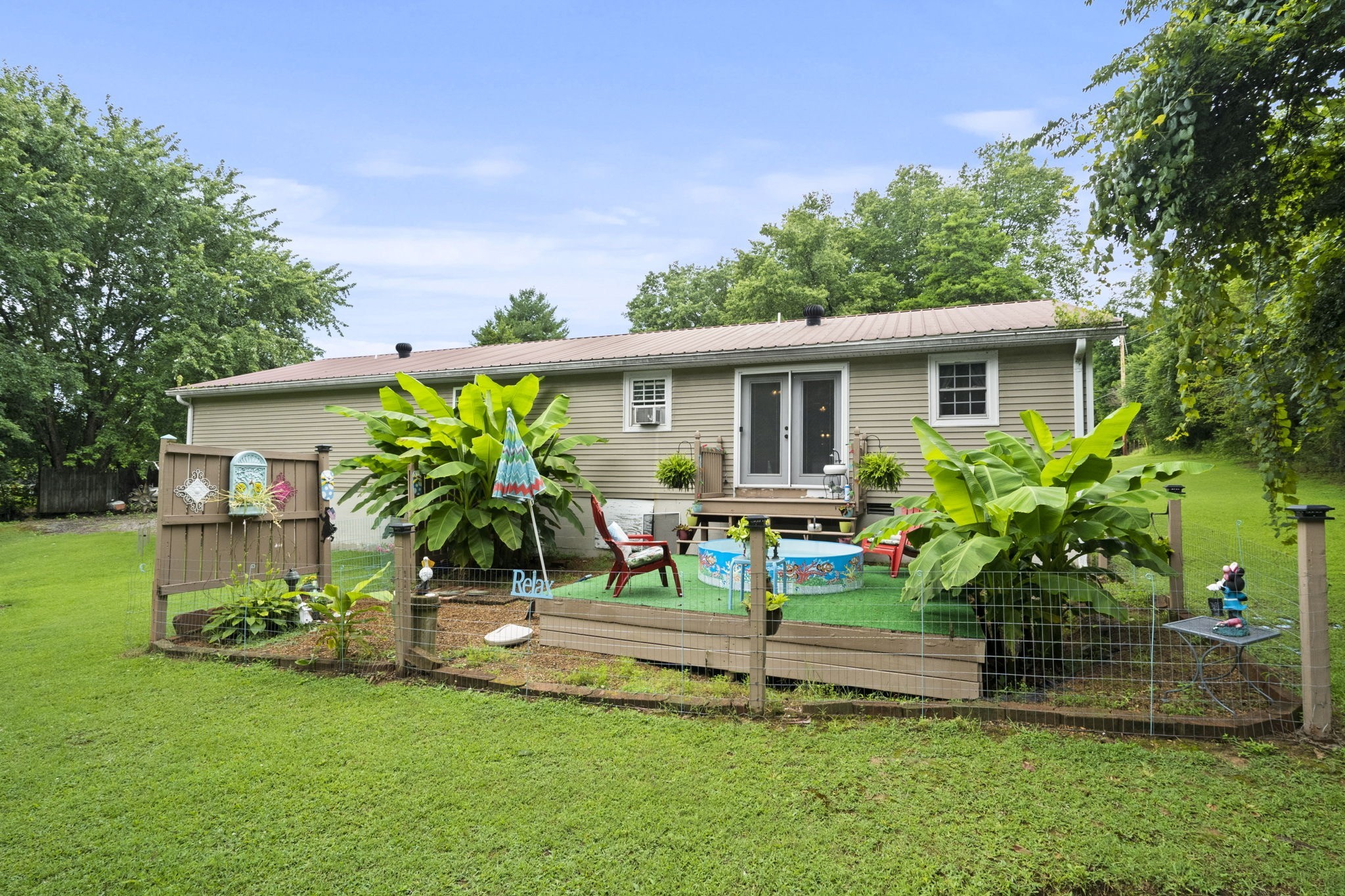 1680 New Deal Potts Road Portland, TN 37148 - Photo 8 of 37 a house view with a garden space