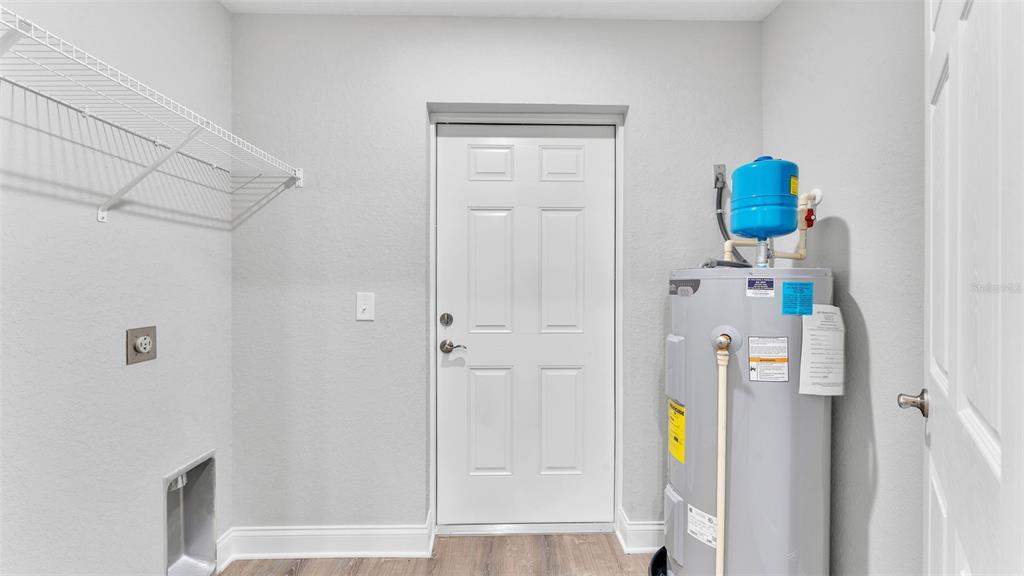 502 2nd Street Southwest Fort Meade, FL 33841 - Photo 26 of 39 a view of a bedroom from a hallway