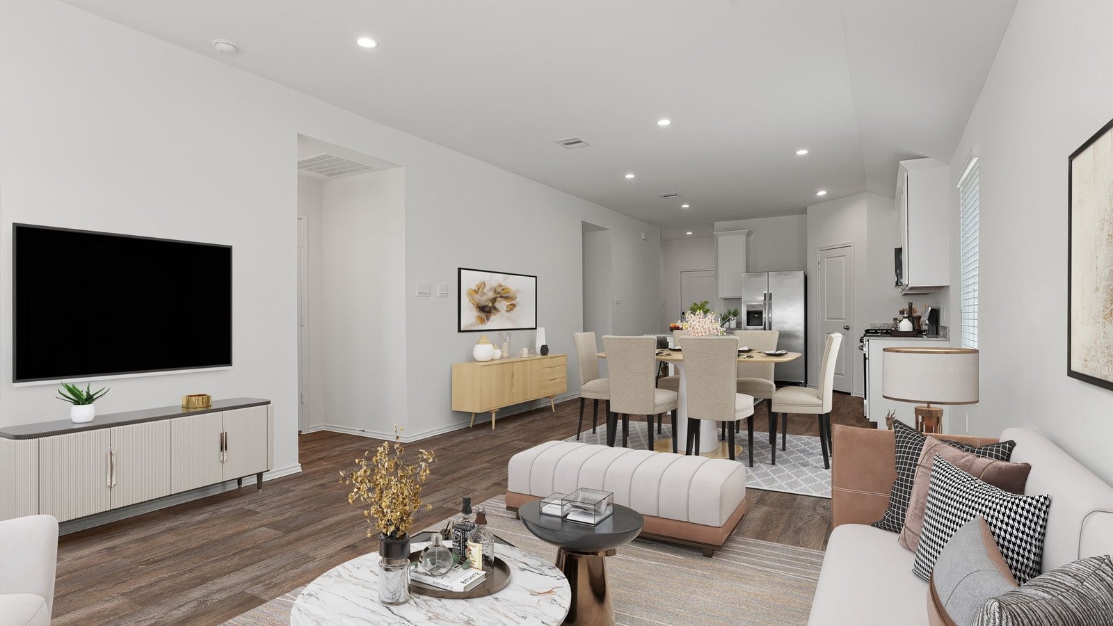 3623 Koop Loop Fulshear, TX 77423 - Photo 16 of 47 a living room with furniture and a flat screen tv