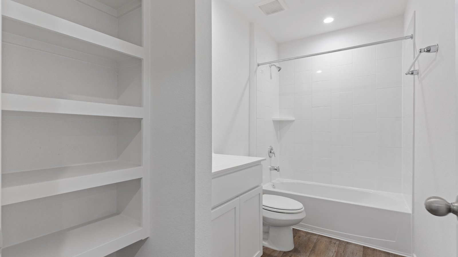 3623 Koop Loop Fulshear, TX 77423 - Photo 6 of 47 a bathroom with a toilet and a shower