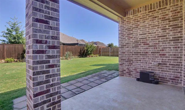 a view of a building with backyard