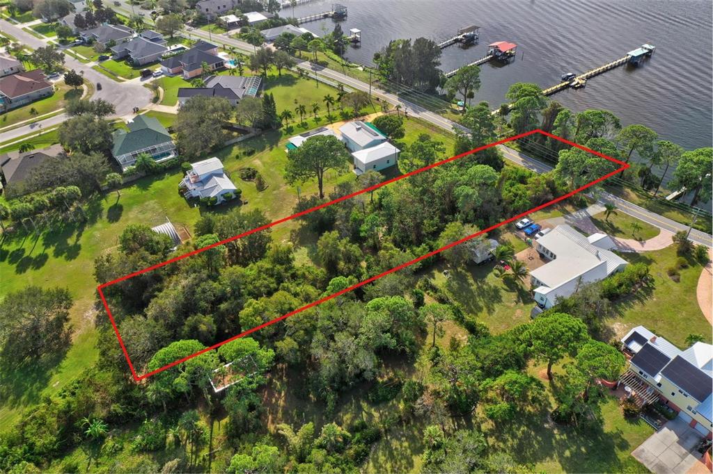 0 South Tropical Trail Merritt Island, FL 32952 - Photo 25 of 46 an aerial view of residential houses with outdoor space