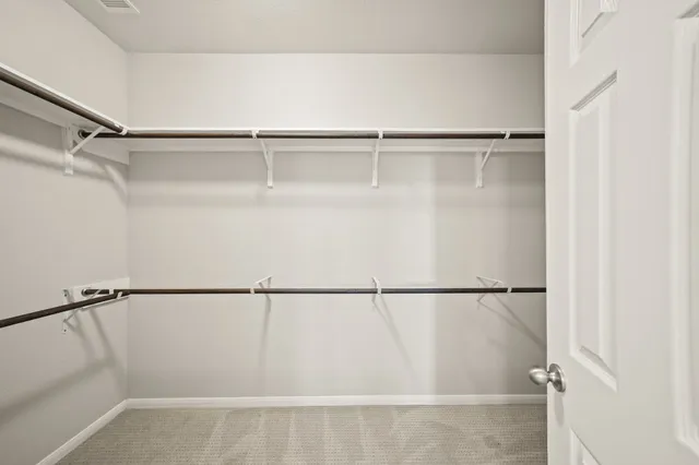 a bathroom with a tub and a shower