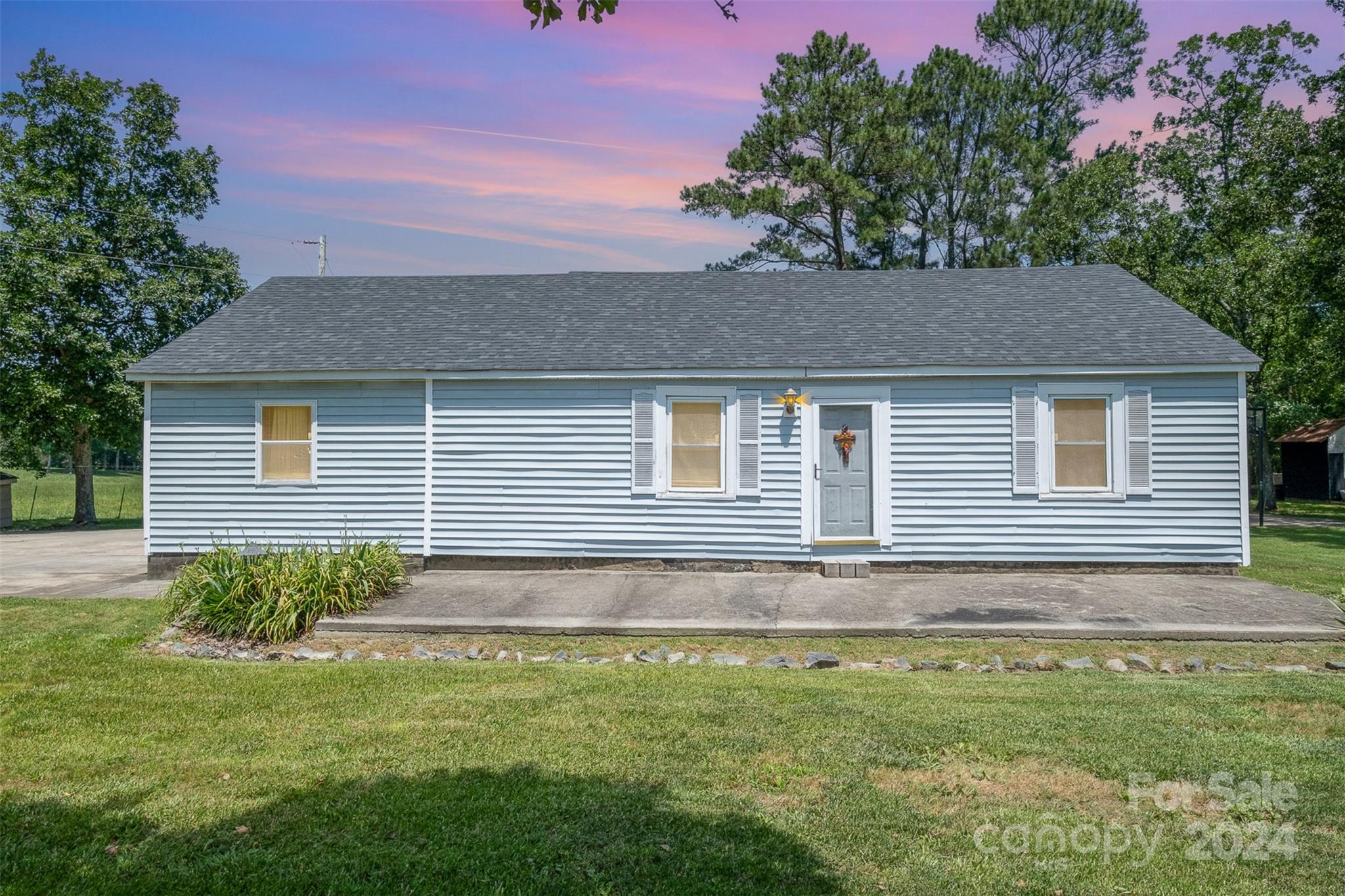 6907 St Timothy Road Marshville, NC 28103 - Photo 1 of 21 a front view of a house with a yard