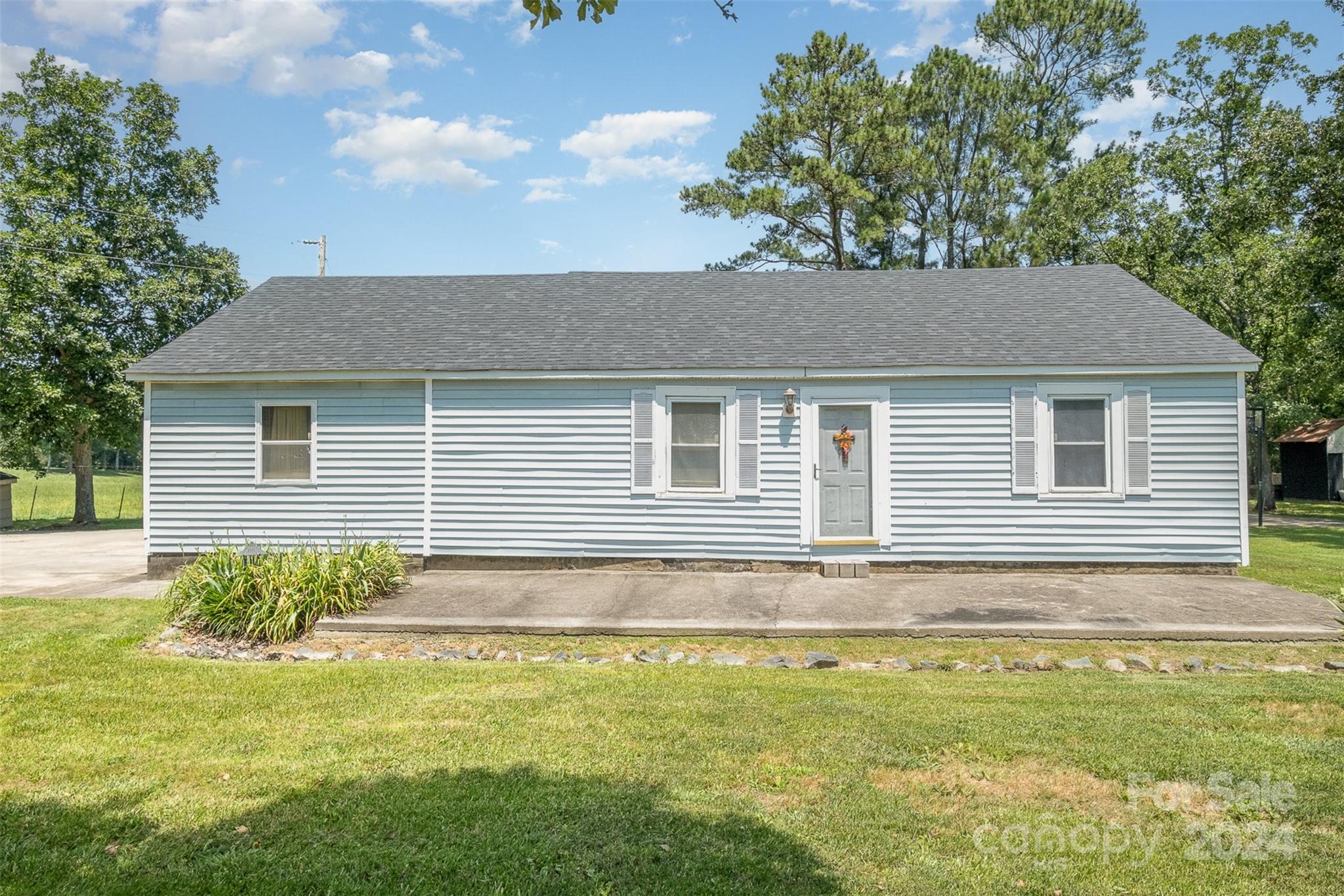 6907 St Timothy Road Marshville, NC 28103 - Photo 13 of 21 a house that has a lot of plants in it