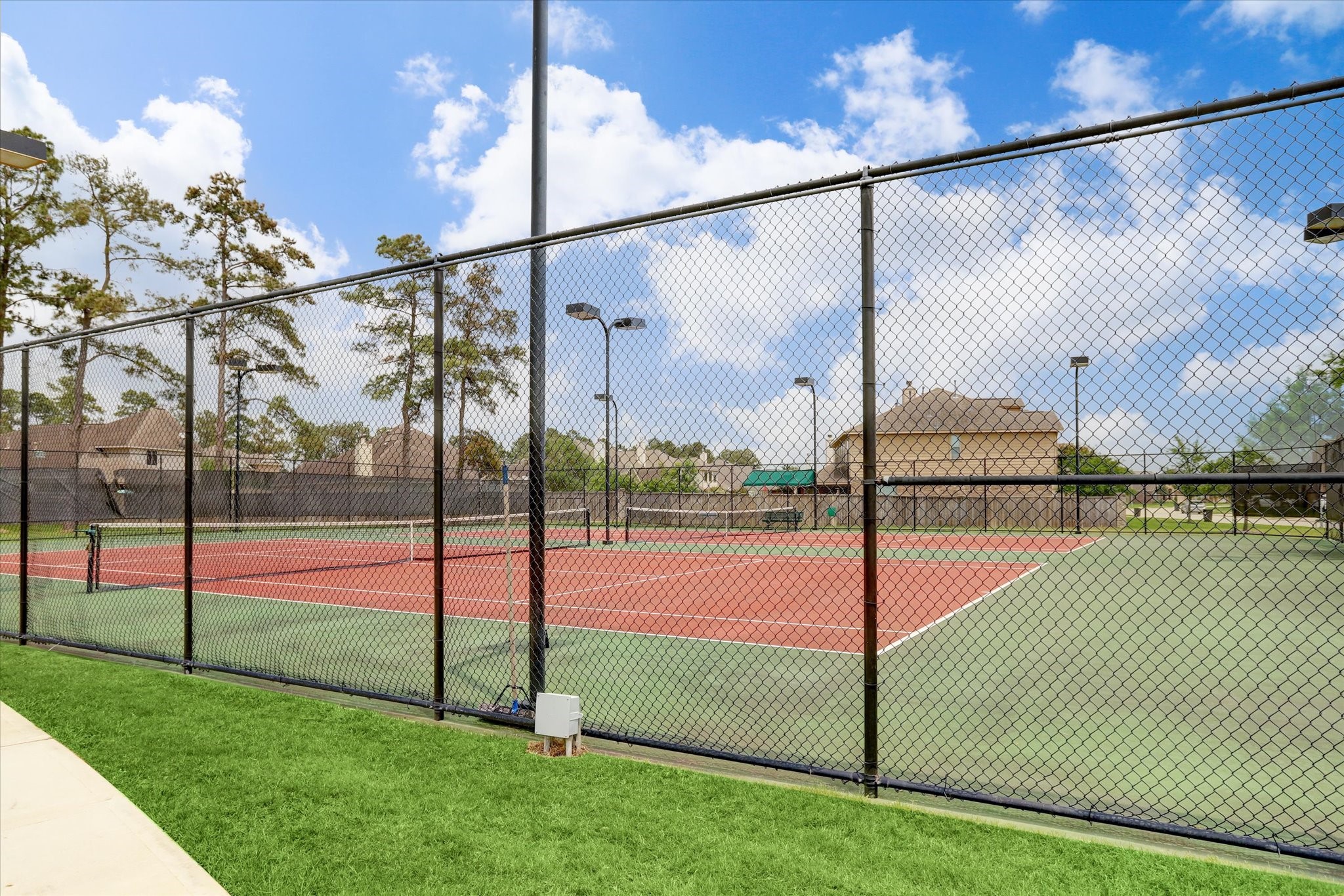 17903 Rushing Hollow Court Tomball, TX 77377 - Photo 33 of 34 a view of a tennis court