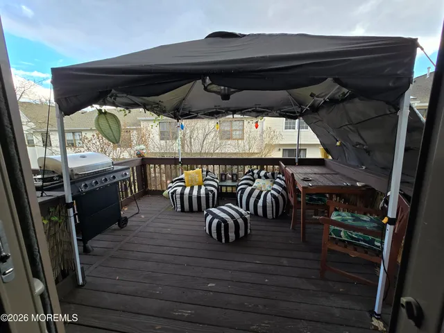 a room with a couch and a flat screen tv