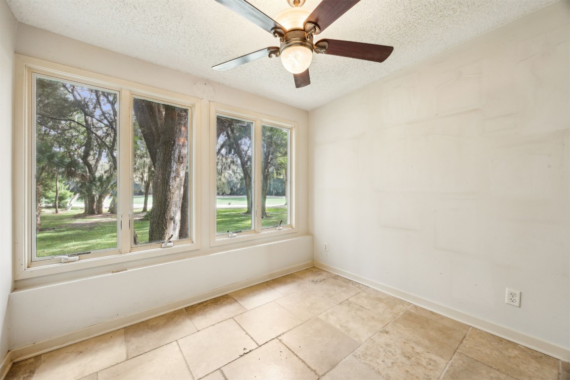 3316 Sea Marsh Road, Unit 3316 Fernandina Beach, FL 32034 - Photo 13 of 38 a view of an empty room with a window