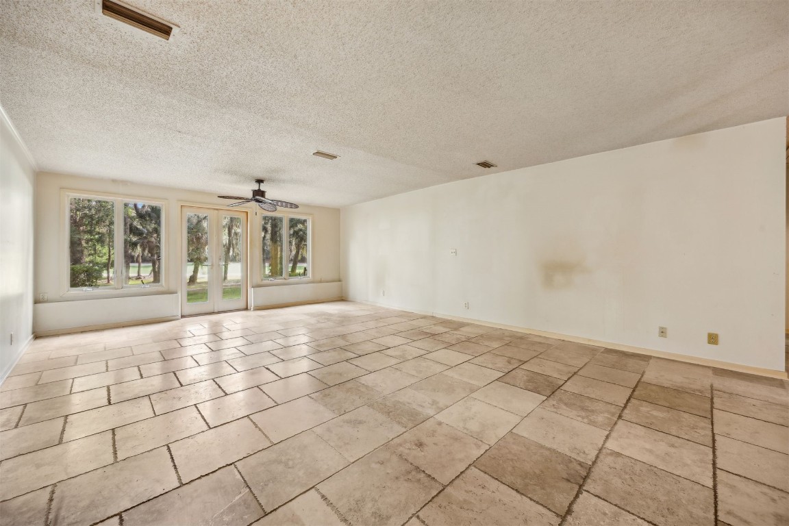 3316 Sea Marsh Road, Unit 3316 Fernandina Beach, FL 32034 - Photo 4 of 38 a view of an empty room with windows