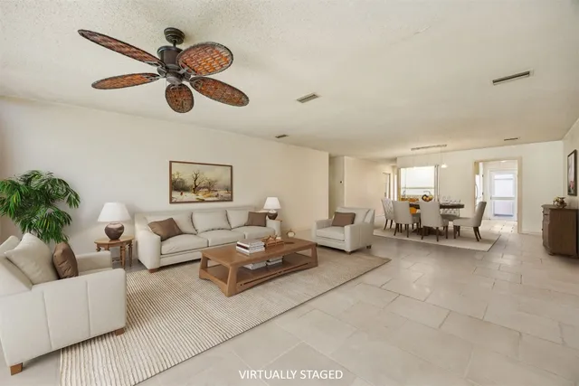 a kitchen with stainless steel appliances granite countertop a stove microwave and cabinets