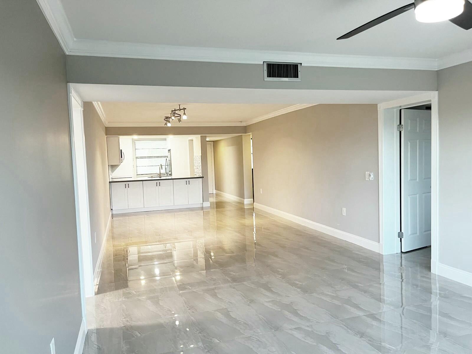 6097 Balboa Circle, Unit 403 Boca Raton, FL 33433 - Photo 2 of 10 Livingroom/Dining