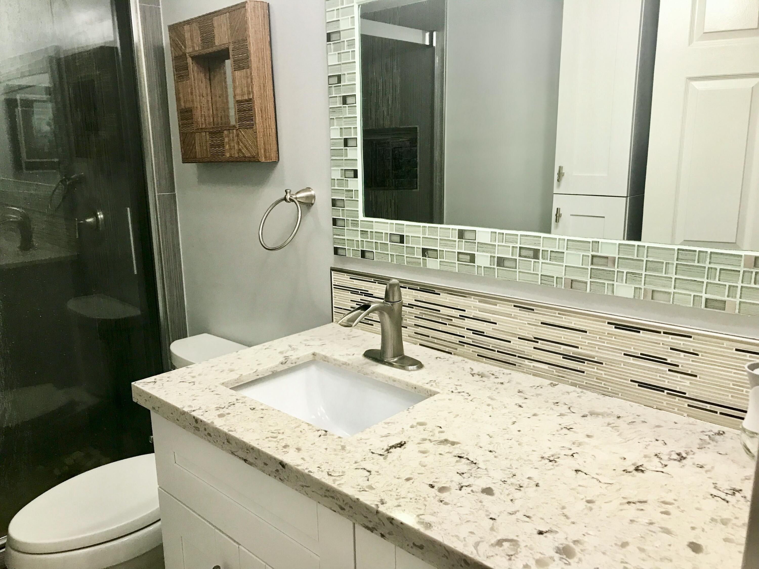 6097 Balboa Circle, Unit 403 Boca Raton, FL 33433 - Photo 5 of 10 Guest Bedroom