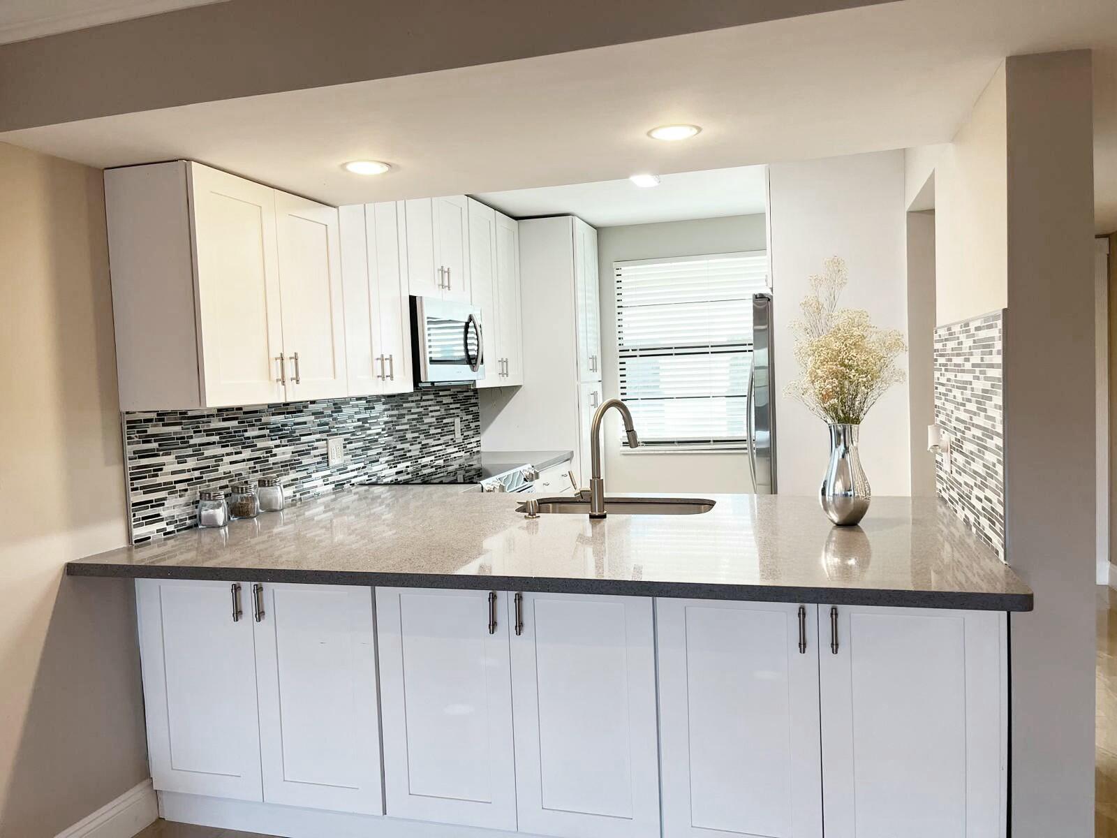 6097 Balboa Circle, Unit 403 Boca Raton, FL 33433 - Photo 7 of 10 Kitchen