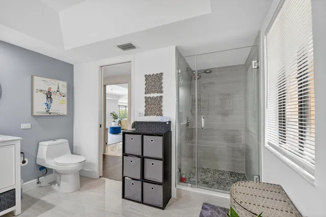 a view of a park with large trees