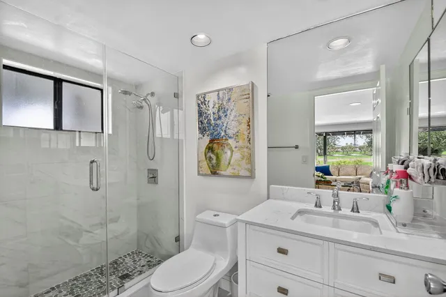 a view of a lake with a city