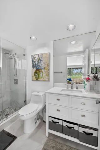 an outdoor space with swimming pool and furniture