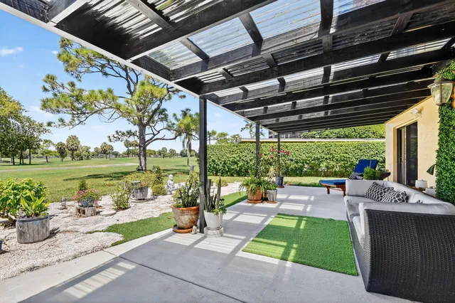 a large bathroom with a large mirror vanity and sink