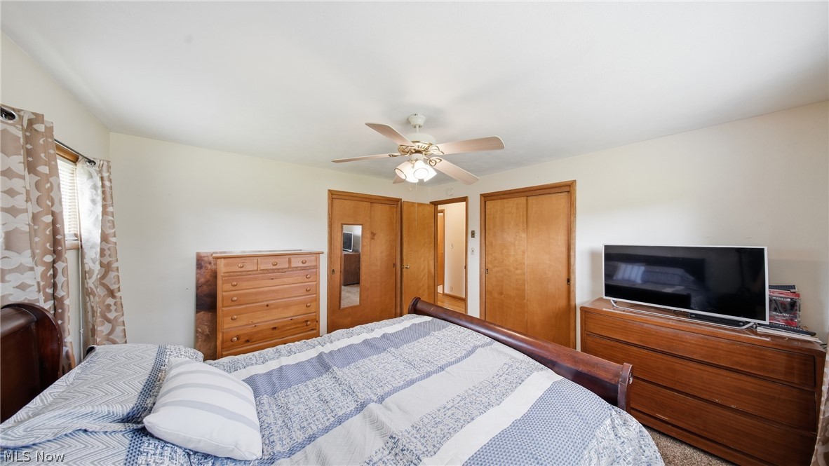 89 Dagg Road Parkersburg, WV 26101 - Photo 29 of 45 Bedroom featuring light beige walls and a ceiling fan with light fixture