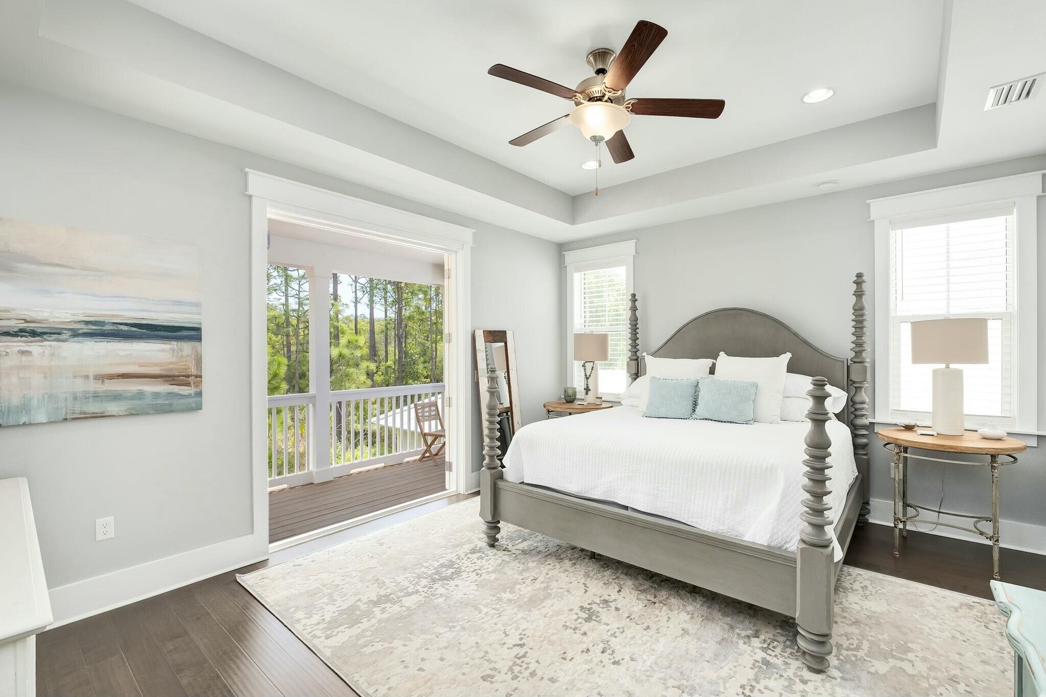 116 Prairie Pass Santa Rosa Beach, FL 32459 - Photo 15 of 59 a bedroom with a large bed and a large window