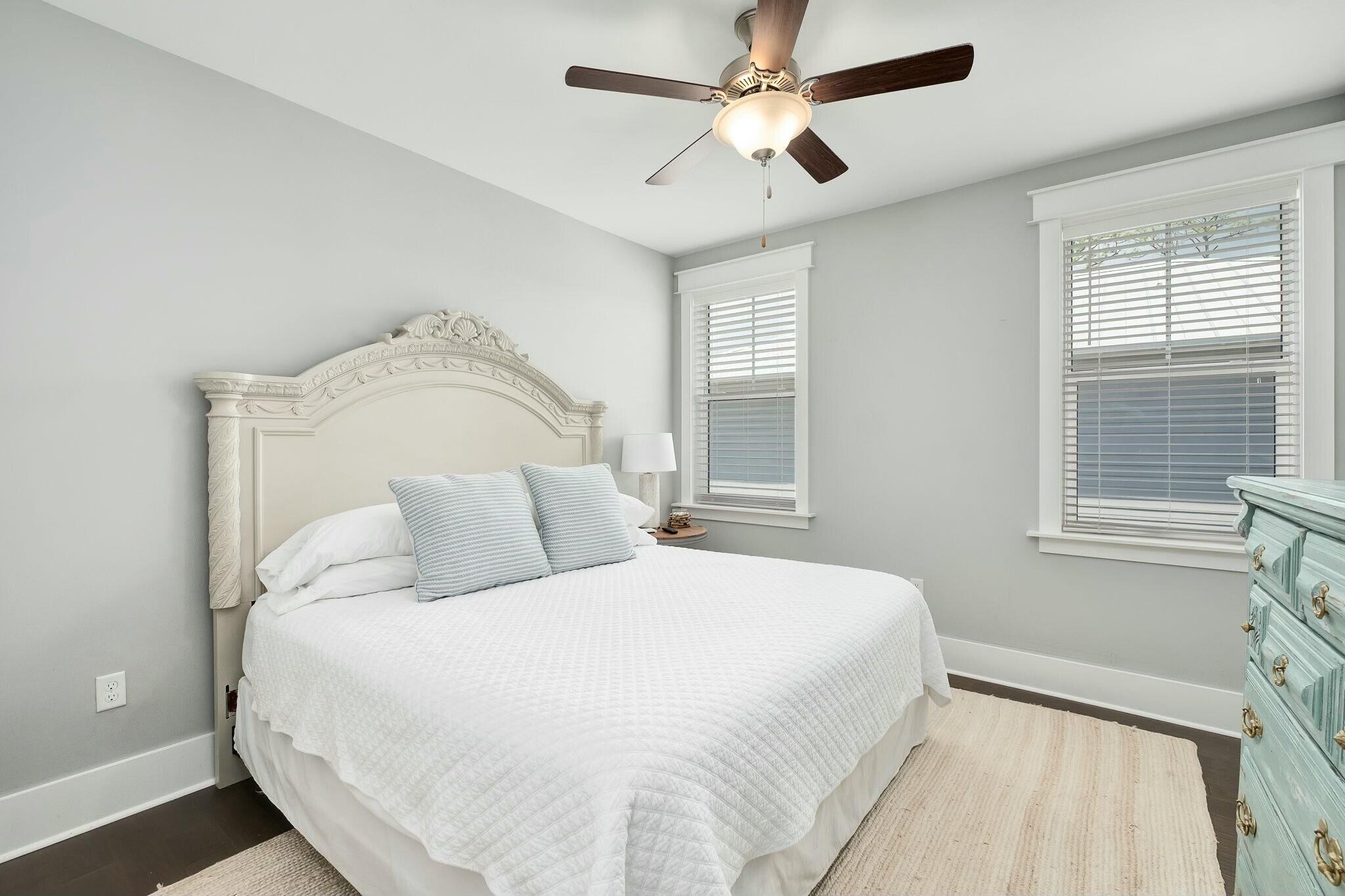 116 Prairie Pass Santa Rosa Beach, FL 32459 - Photo 21 of 59 a bedroom with a large bed and a window