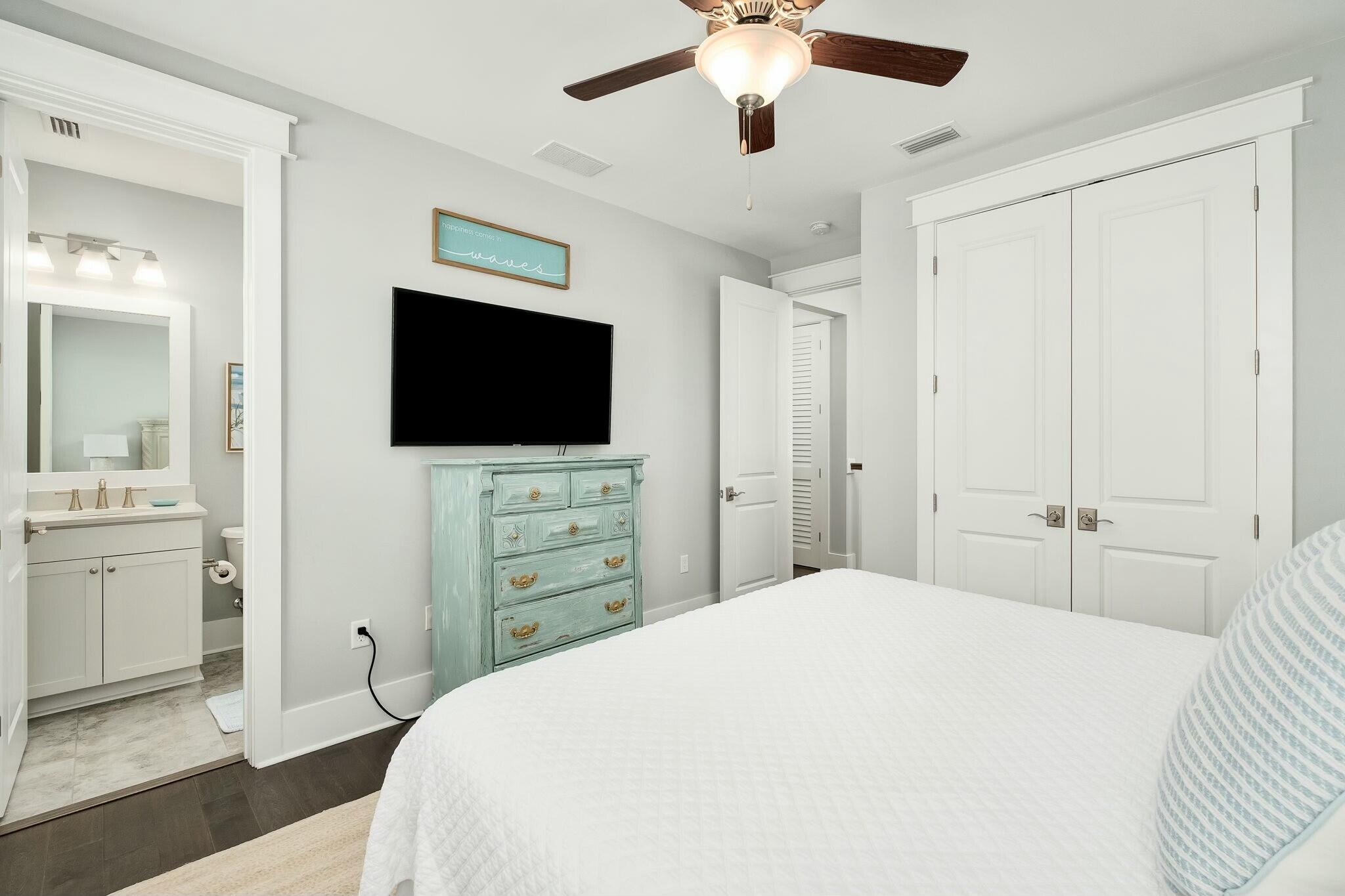116 Prairie Pass Santa Rosa Beach, FL 32459 - Photo 22 of 59 a bedroom with a bed and a flat screen tv