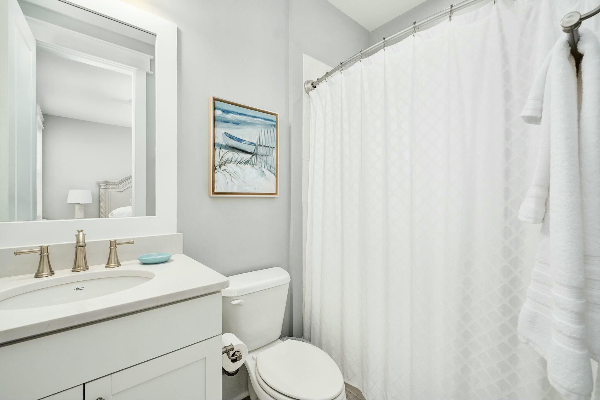 116 Prairie Pass Santa Rosa Beach, FL 32459 - Photo 23 of 59 a bathroom with a toilet a sink and a mirror