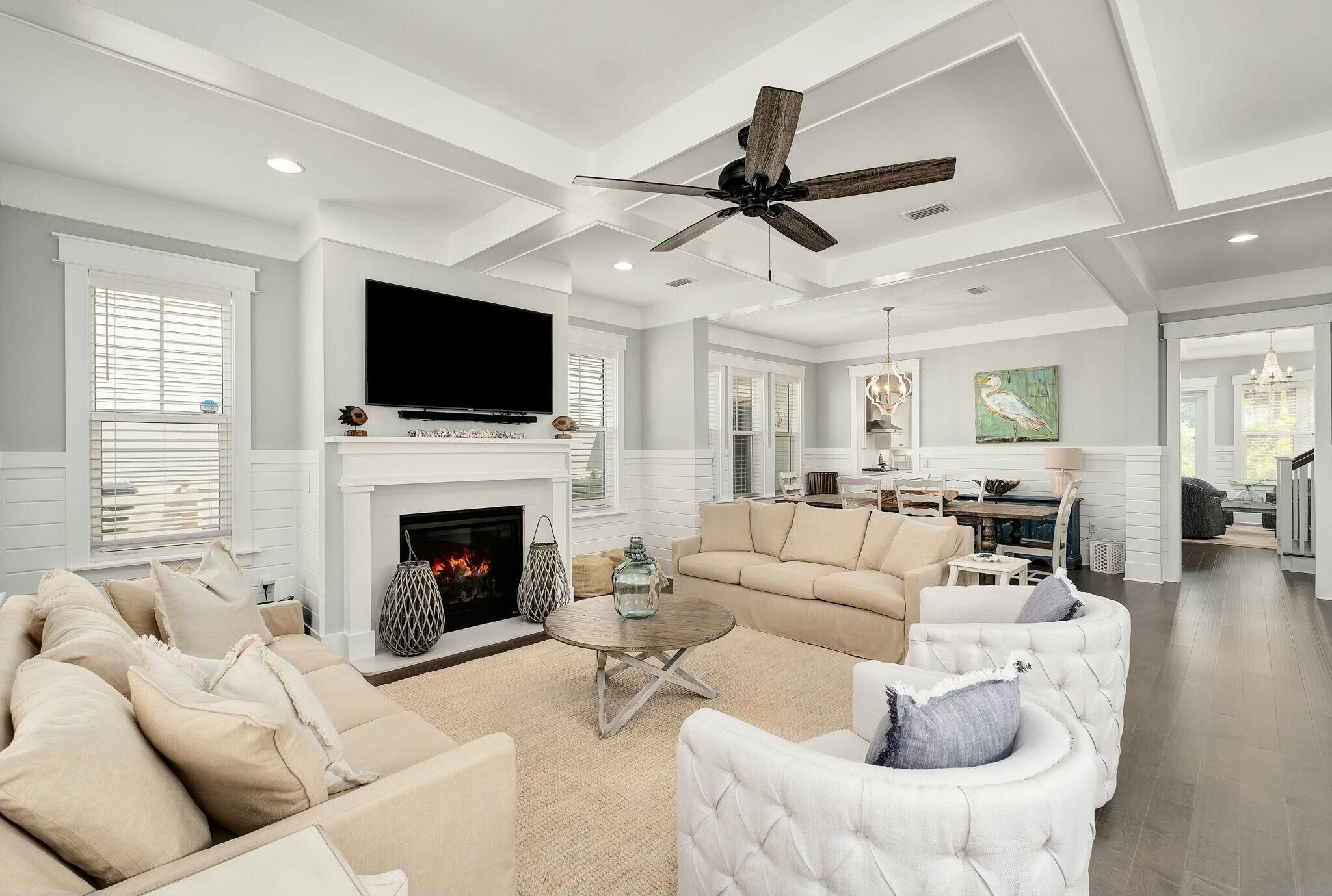 116 Prairie Pass Santa Rosa Beach, FL 32459 - Photo 5 of 59 a living room with furniture a fireplace and a flat screen tv