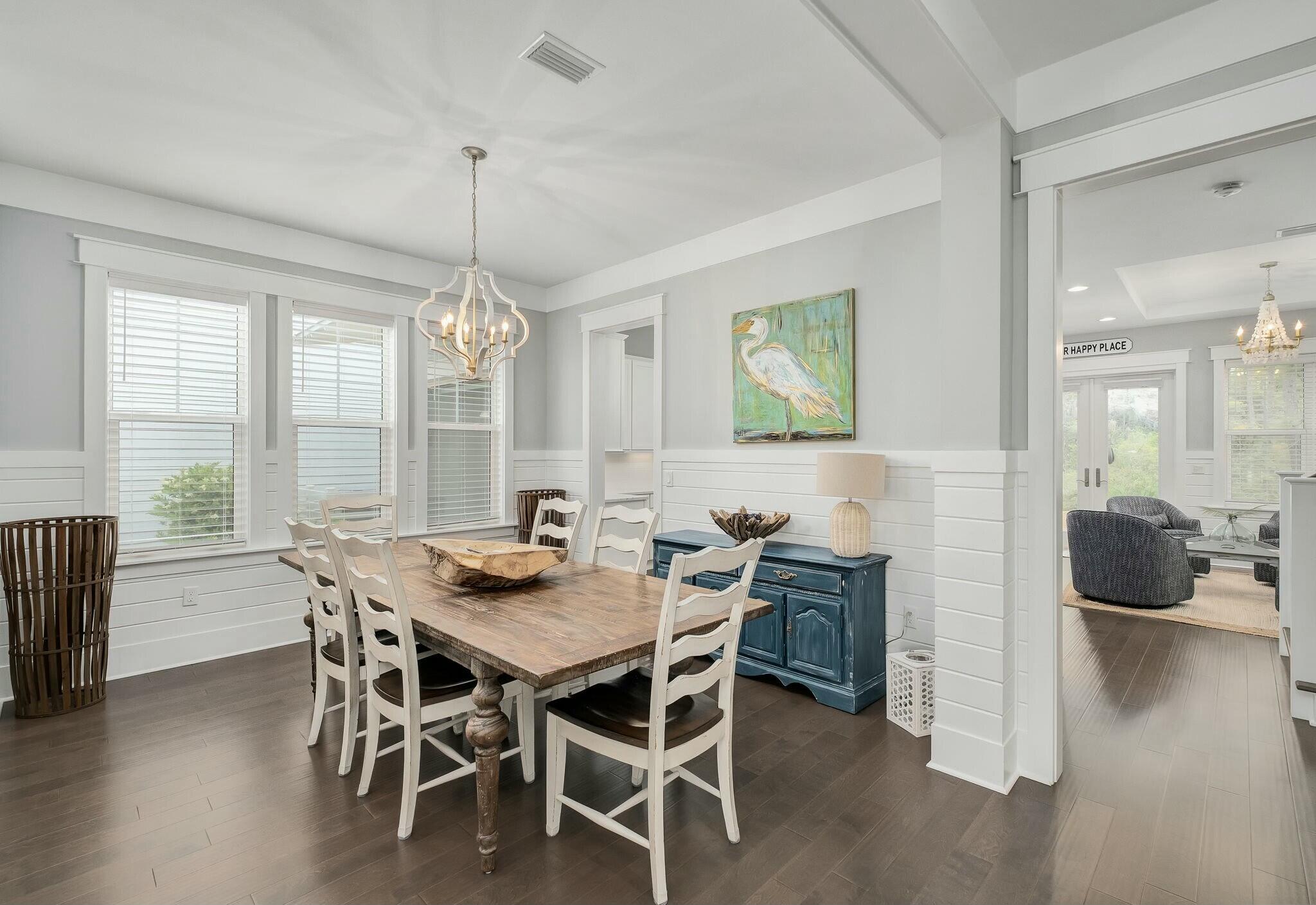 116 Prairie Pass Santa Rosa Beach, FL 32459 - Photo 8 of 59 a dining room with furniture window wooden floor