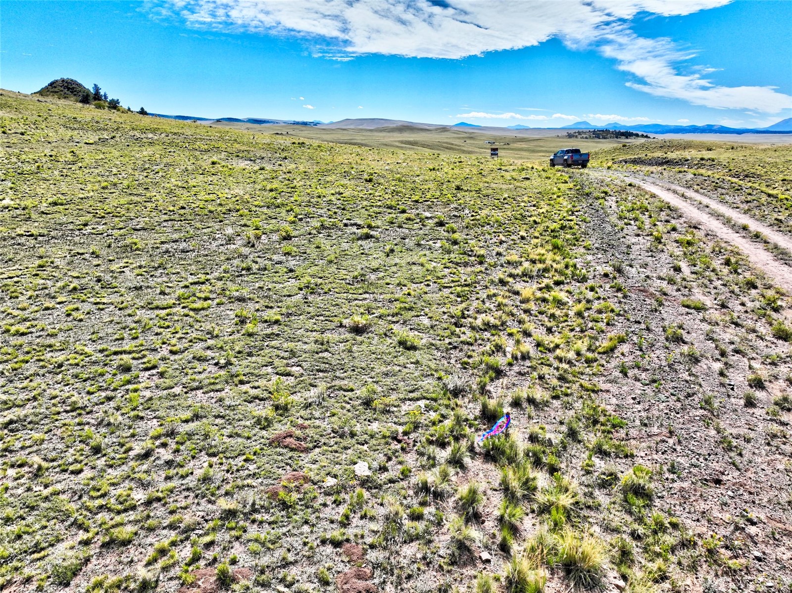 3972 Seneca Road Hartsel, CO 80449 - Photo 5 of 12 Aerial view with a mountain view and a rural view