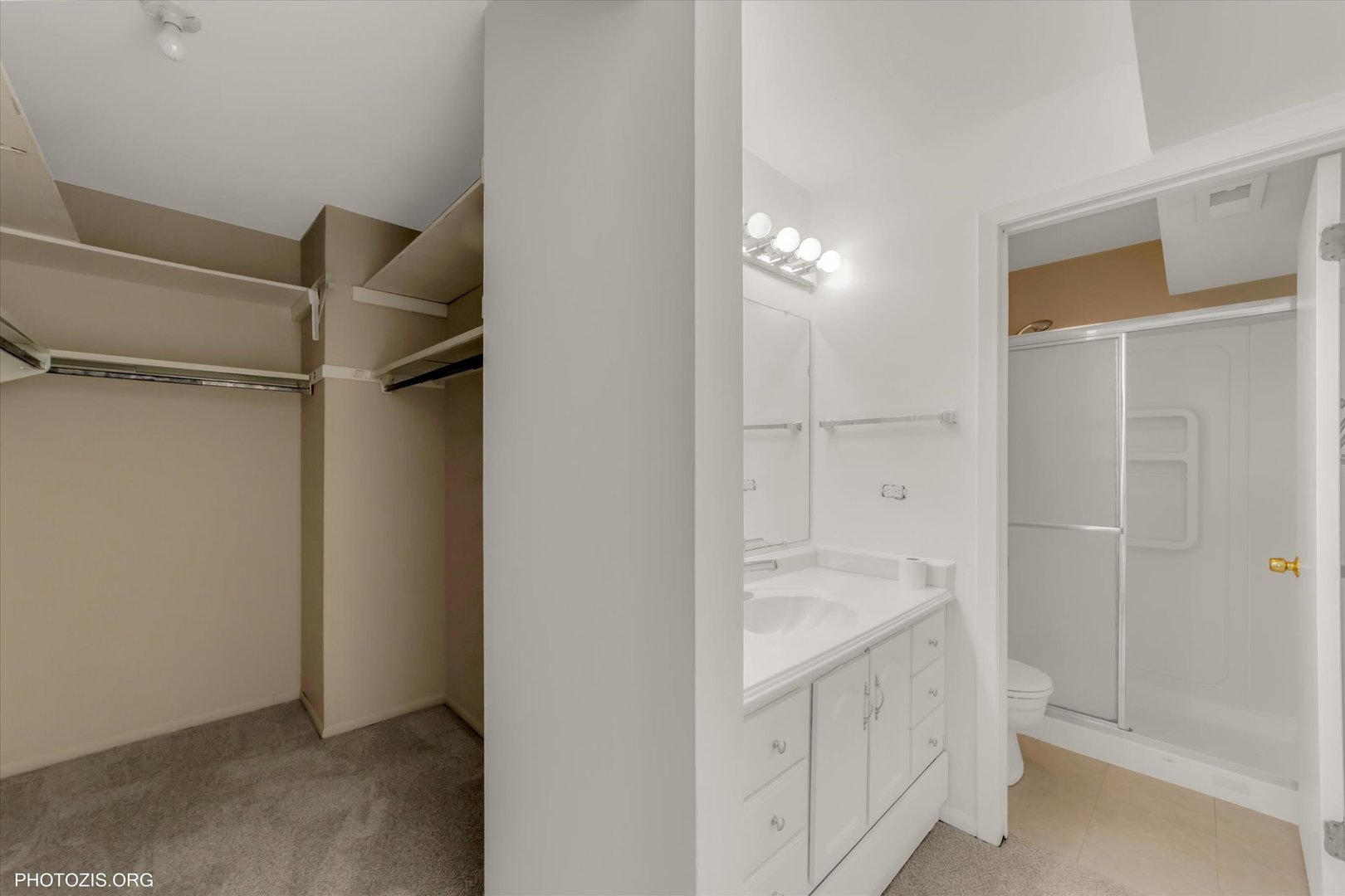 918 East Kings Row, Unit 1 Palatine, IL 60074 - Photo 15 of 23 a bathroom with a sink a toilet and shower