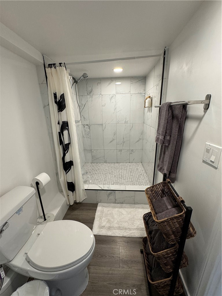 774 Stephens Avenue Fullerton, CA 92833 - Photo 7 of 9 a bathroom with a toilet and a shower