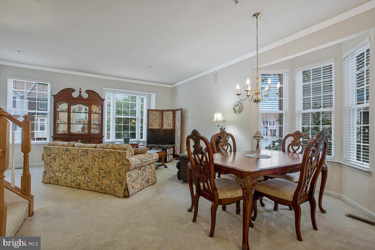 224 Tilden Way, Unit 224 Edgewater, MD 21037 - Photo 19 of 49 Dining Rm/ Living room combo w/plenty of windows.