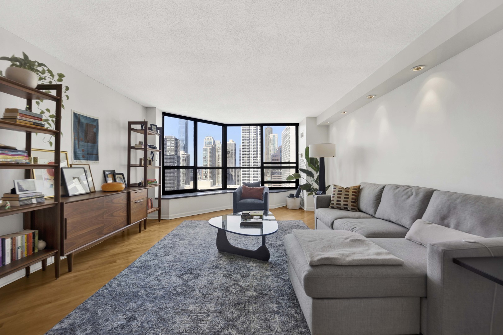 405 North Wabash Avenue, Unit 2614 Chicago, IL 60611 - Photo 2 of 22 a living room with furniture and a large window