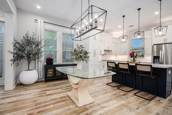 a view of a living room and kitchen