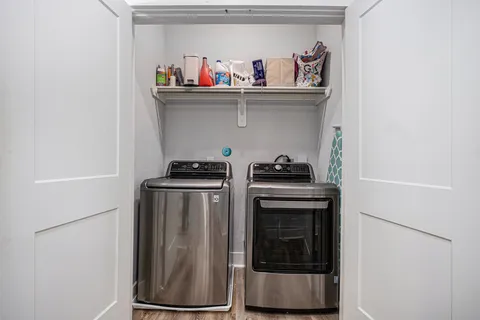 a kitchen with stainless steel appliances a stove and a refrigerator