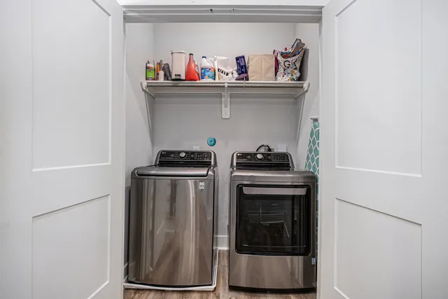 a kitchen with stainless steel appliances a stove and a refrigerator