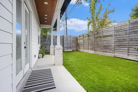 a view of a backyard with garden