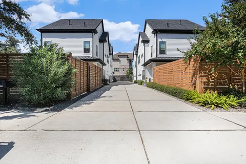 a view of a house with large windows