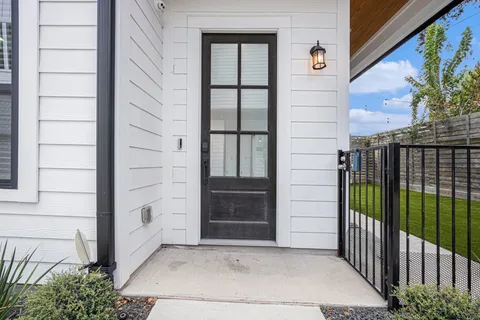 a view of entrance gate of the house