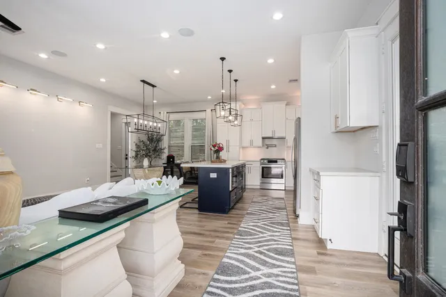 a kitchen with a sink a counter top space and appliances
