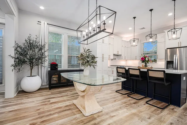 a view of a living room and kitchen