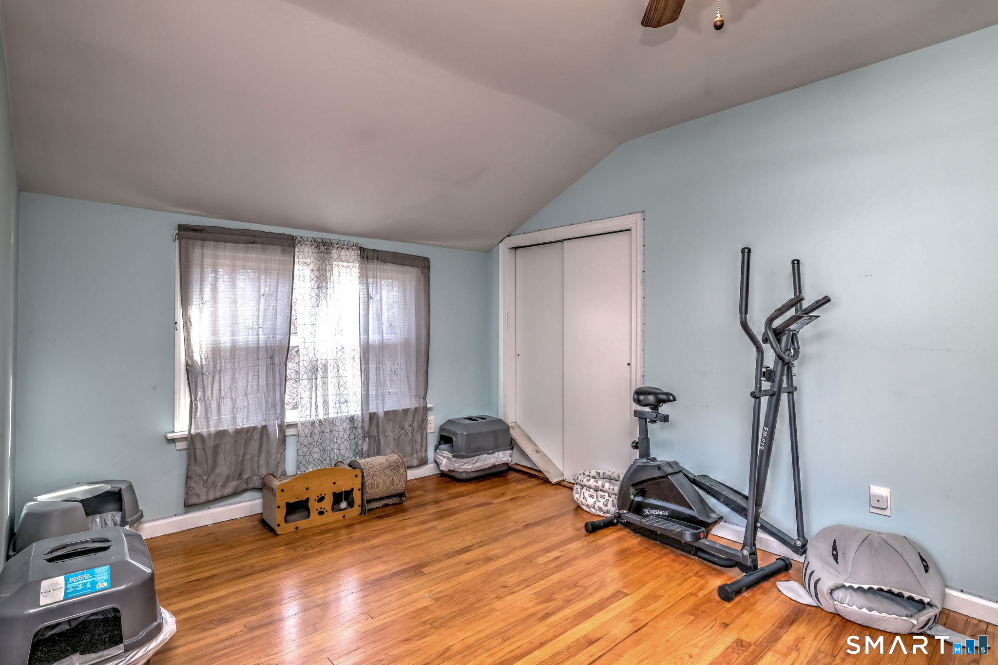 51 Joy Road Waterbury, CT 06708 - Photo 31 of 39 a room with gym equipment and wooden floor