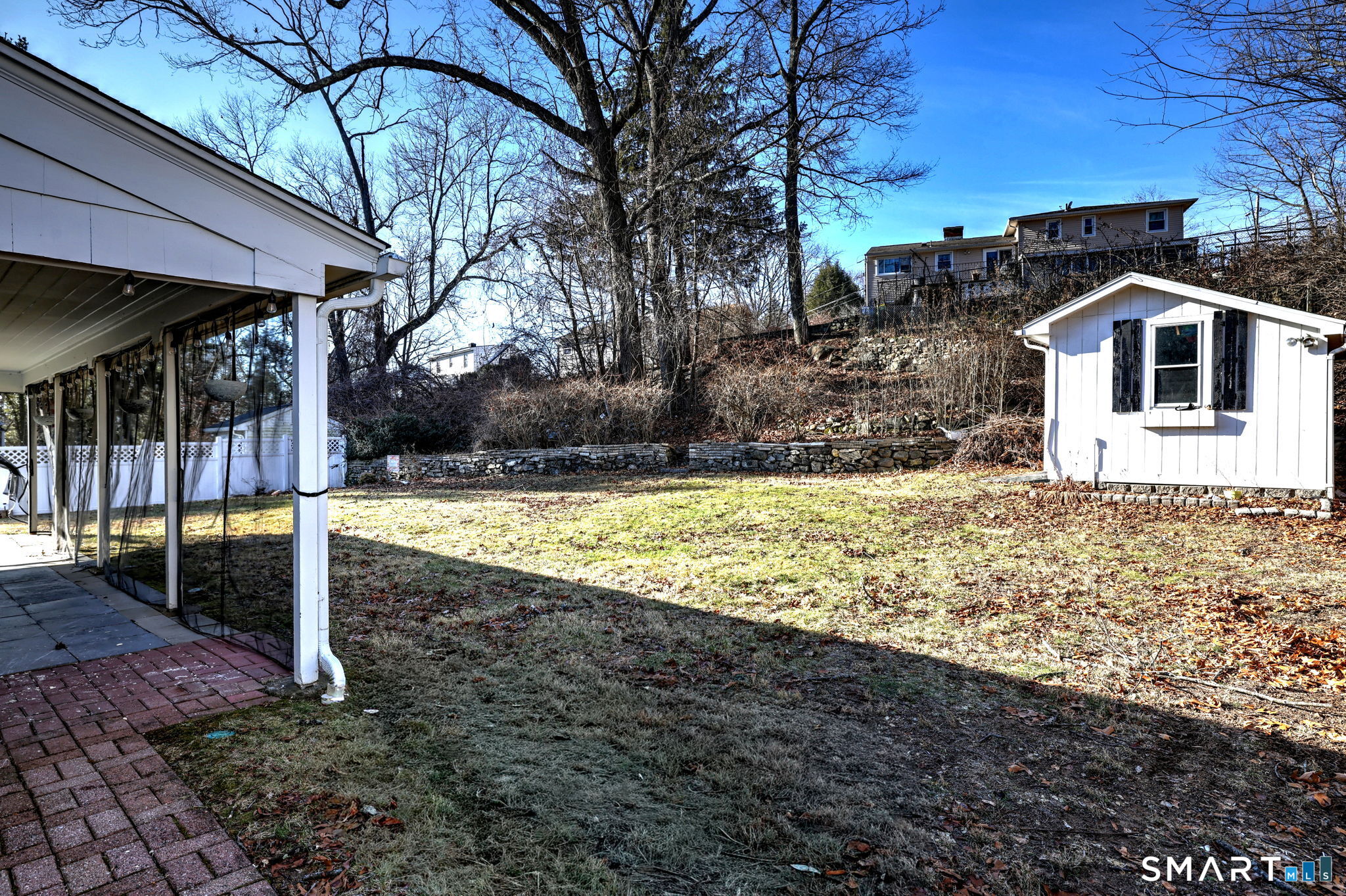 51 Joy Road Waterbury, CT 06708 - Photo 5 of 39 a view of a house with backyard and trees