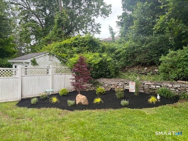 51 Joy Road Waterbury, CT 06708 - Photo 6 of 39 a view of a house with a yard