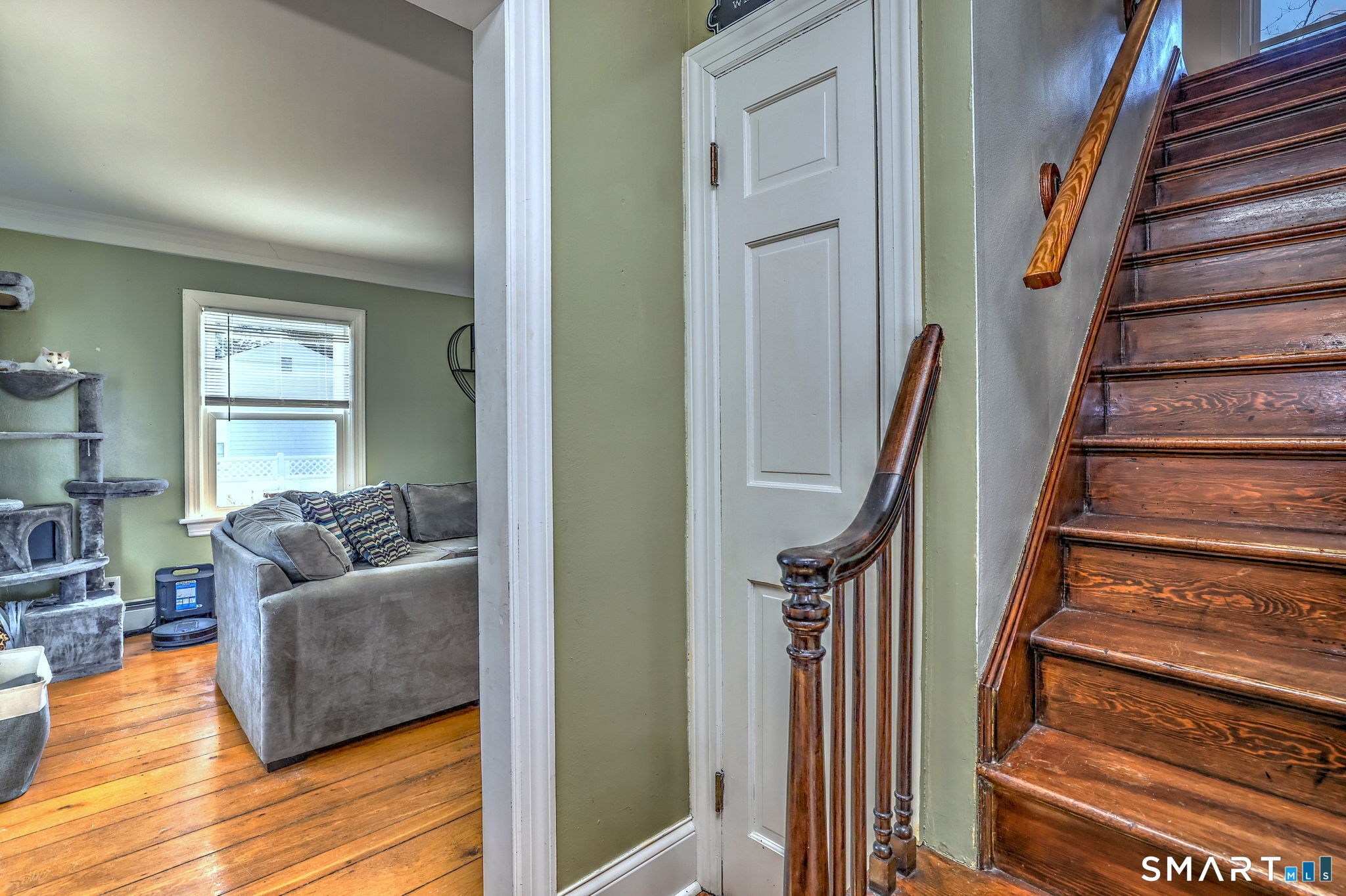 51 Joy Road Waterbury, CT 06708 - Photo 8 of 39 a living room with furniture and a wooden floor