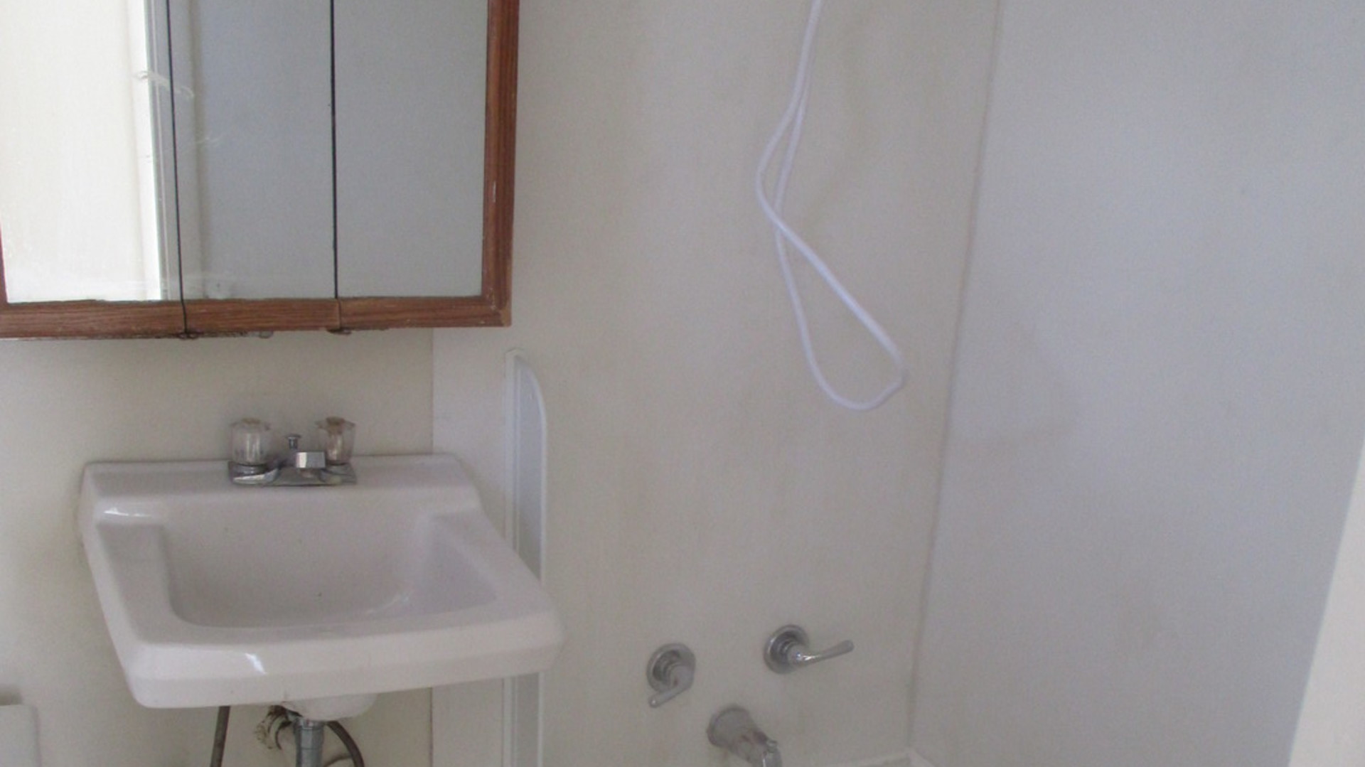 1517 Pine Street Ottawa, IL 61350 - Photo 4 of 4 a bathroom with a sink and a toilet